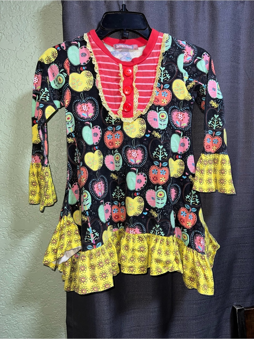 Jelly The Pug Girls Black Candy Apple Print Ruffle Dress with Yellow Accents